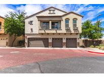 Beautiful three-story townhome featuring a charming balcony and three-car garage at 2727 N Price Rd # 3, Chandler, AZ 85224