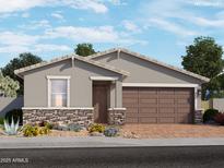 Inviting single-story home with desert landscaping and a stone-accented facade at 8950 W Albeniz Pl, Tolleson, AZ 85353