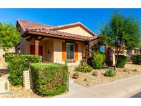 Charming single-story home with Southwestern architectural details, desert landscaping and a welcoming front porch at 17139 S 174Th Dr, Goodyear, AZ 85338