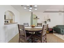 Charming dining room with rustic wood table and modern light fixture at 811 W 13Th St, Tempe, AZ 85281