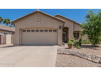 Charming single-story home featuring a two-car garage and well-maintained landscaping, promoting curb appeal at 829 S Roanoke St, Gilbert, AZ 85296