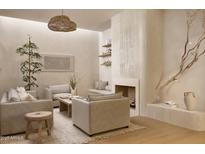 Inviting living room with neutral tones, comfortable seating, and a unique fireplace design at 5101 N Casa Blanca Dr # 223, Paradise Valley, AZ 85253