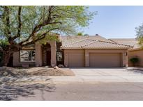 Charming single-story home with a three-car garage and a well-maintained front yard at 5185 W Del Rio St, Chandler, AZ 85226