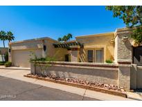 Charming single-story home with a landscaped front yard and inviting curb appeal at 9012 S 47Th Pl, Phoenix, AZ 85044
