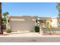 Charming single-story home featuring a two-car garage and a landscaped front yard on a bright, sunny day at 9012 S 47Th Pl, Phoenix, AZ 85044