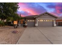 Charming home featuring a well-maintained yard, a neutral color palette, and a spacious three-car garage at 287 W Ivanhoe St, Gilbert, AZ 85233