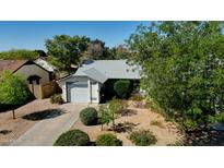 Charming single-story home featuring a well-maintained front yard and attached one car garage at 3106 W Mohawk Ln, Phoenix, AZ 85027