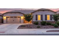 Charming single-story home with a well-manicured front yard and a cozy, inviting entrance with ample parking space at 7234 S 28Th Ln, Phoenix, AZ 85041
