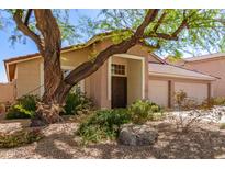 Charming single-Gathering home with a well-maintained lawn and a convenient three-car garage at 1631 E Carla Vista Dr, Chandler, AZ 85225