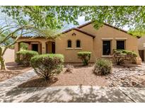 Charming single-story home featuring desert landscaping and a welcoming covered porch at 1843 S Sunnyvale Ave, Gilbert, AZ 85295