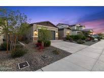 Charming single-story home with a desert-landscaped front yard and a two-car garage at 19231 W Missouri Ave, Litchfield Park, AZ 85340