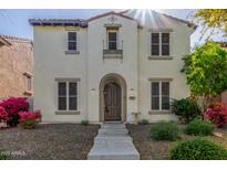 Charming two-story home with a well-maintained yard and beautiful front door at 28967 N 124Th Ave, Peoria, AZ 85383