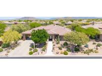 Beautiful single-story home featuring desert landscaping, mountain views and a tile roof at 7500 E Pontebella Dr, Scottsdale, AZ 85266