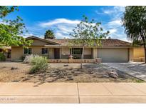 Attractive ranch-style home with a well-kept front yard and inviting curb appeal at 425 E Del Rio Dr, Tempe, AZ 85282
