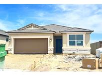 Single-Gathering home showing a two-car garage, neutral color palette, and desert landscaping at 8394 W Clemente Way, Florence, AZ 85132