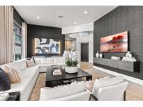 Stylish living area features modern decor, sleek furniture, and an open layout at 15240 N Clubgate Dr # 137, Scottsdale, AZ 85254