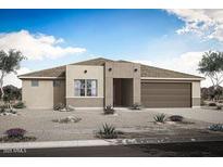 Stylish single-story home featuring a contemporary design and a low-maintenance desert landscape at 17429 W Via Dona Rd, Surprise, AZ 85387