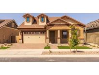Charming single-Gathering home with a two-car garage, lovely landscaping, and a welcoming front porch at 4320 E Bernice St, Gilbert, AZ 85295
