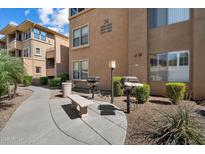 Landscaped exterior with grills and comfortable seating at this apartment complex at 20100 N 78Th Pl # 3084, Scottsdale, AZ 85255