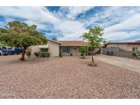 Well-maintained single-story home with desert landscaping, providing curb appeal at 1934 W Colter St, Phoenix, AZ 85015