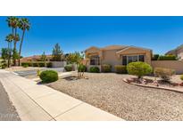 Charming desert home with low-maintenance landscaping and clear blue skies at 13731 W Countryside Dr, Sun City West, AZ 85375