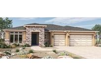 Charming single-story home featuring a three-car garage and an attractive stone facade entryway at 20237 W San Juan Ave, Litchfield Park, AZ 85340