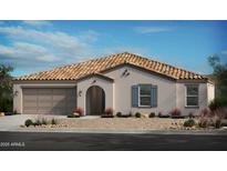 Charming single-story home featuring a stylish beige color scheme, tile roof, and a well-manicured desert landscape at 1409 E Jacqueline Pl, Casa Grande, AZ 85122