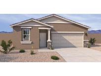 Charming single-story home with desert landscaping and a two-car garage at 18232 W La Senda Dr, Surprise, AZ 85387