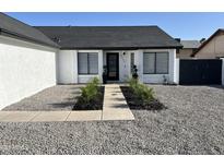 Charming single-story home featuring a well-maintained lawn and modern design at 6217 W Comet Ave, Glendale, AZ 85302