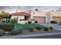 Charming single-story home boasts mature landscaping and a neutral color palette at 2635 N 62Nd St, Mesa, AZ 85215