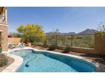 Inviting pool featuring desert landscaping and mountain views at 18267 N 95Th St, Scottsdale, AZ 85255
