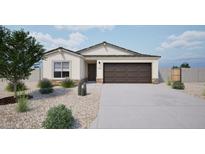 Charming single-story home featuring a neutral color palette, desert landscaping and a two-car garage at 1442 W Tigua Way, Coolidge, AZ 85128