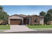 Charming single-story home with a two-car garage, stone accents and a well-manicured lawn at 16842 W Bronco Trl, Surprise, AZ 85387