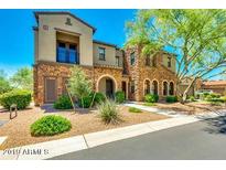 Charming two-story home with stone accents, manicured landscaping and a private balcony at 20750 N 87Th St # 2038, Scottsdale, AZ 85255
