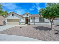 Charming single-story home with a well-maintained xeriscaped front yard at 2845 N 104Th Ave, Avondale, AZ 85392