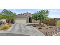 Charming single-story home with a two-car garage, desert landscaping, and a well-maintained front yard at 37103 N El Morro Trl, San Tan Valley, AZ 85140