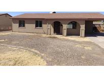 Charming single-story home with a covered porch and a low maintenance front yard at 6226 W Coronado Rd, Phoenix, AZ 85035