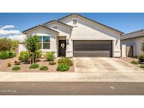 Charming single-story home featuring a two-car garage and welcoming front yard at 1482 W Gloucester W Rd, San Tan Valley, AZ 85143