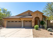 Charming single-story home with a three-car garage and well-maintained desert landscaping at 10287 E Verbena Ln, Scottsdale, AZ 85255
