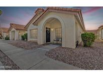Charming single-story home featuring a welcoming archway entrance and well-kept landscaping at 1120 N Val Vista Dr # 10, Gilbert, AZ 85234