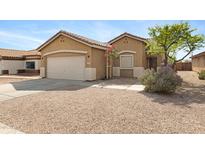 Charming single-story home with a two-car garage and desert landscaping at 204 S Valle Verde --, Mesa, AZ 85208