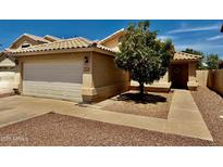 Charming single-Gathering home with a well-maintained front yard and neutral color scheme at 1612 E Barbarita Ave, Gilbert, AZ 85234
