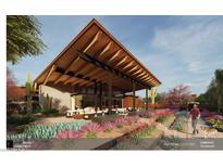 Stunning exterior showcases a modern home with an open-air patio, lush landscaping, and a pathway at 6228 N Cattle Track Rd, Scottsdale, AZ 85250