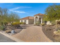 Beautiful home featuring circular drive, desert landscaping, and an inviting entrance at 8540 E Mcdowell Rd # 10, Mesa, AZ 85207