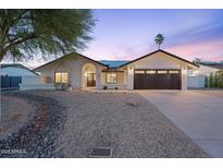 Charming single-story home with desert landscaping, private drive, and two-car garage at 6228 E Blanche Dr, Scottsdale, AZ 85254