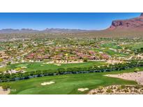 Stunning aerial view of golf course community with mountain views and beautiful desert landscaping at 7780 E Golden Eagle Cir, Gold Canyon, AZ 85118