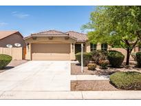 Charming home featuring a well-manicured yard and a spacious two-car garage at 4024 E Maplewood St, Gilbert, AZ 85297