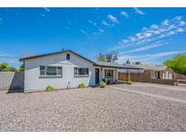 Charming single-story home with a well-maintained, low maintenance yard and covered parking at 1217 N 78Th St, Scottsdale, AZ 85257
