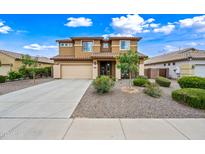 Beautiful two-story home with a well-manicured front yard and a spacious driveway at 3671 E Kingbird Pl, Chandler, AZ 85286
