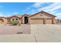 Charming single-story home featuring a well-maintained yard and a spacious two-car garage at 6102 W Shangri La Rd, Glendale, AZ 85304